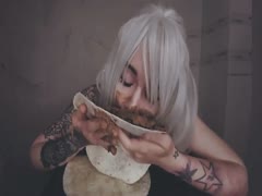 Blonde in stockings eating her own poop as lunch